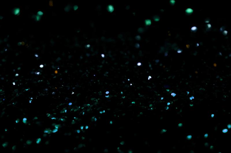 Free Stock Photo: Dark glitter or stars of white, green and blue colors over dark background with copy space