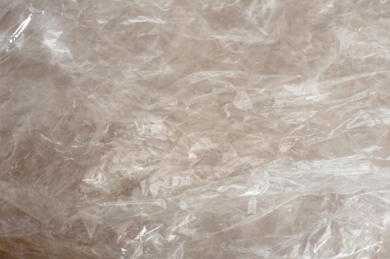 Free Stock Photo: Crinkled clear transparent plastic film background texture in a full frame view