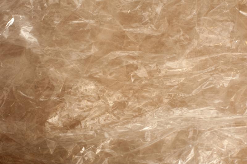 Free Stock Photo: Full frame abstract smooth stone or plastic wrap background with brown tones and copy space