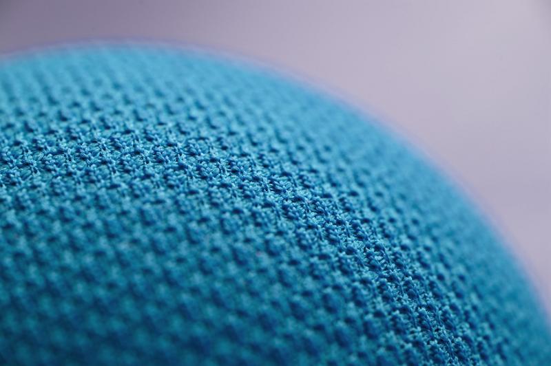 Free Stock Photo: Close up on texture of little blue ball or curved tight shape with gray background