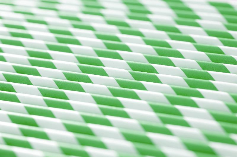 Free Stock Photo: Full frame background of tightly packed close row of green and white straws with copy space