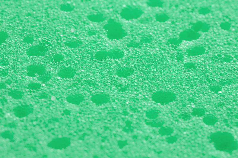 Free Stock Photo: Full frame backround of green pool of liquid with surface bubbles or permeable type sponge texture
