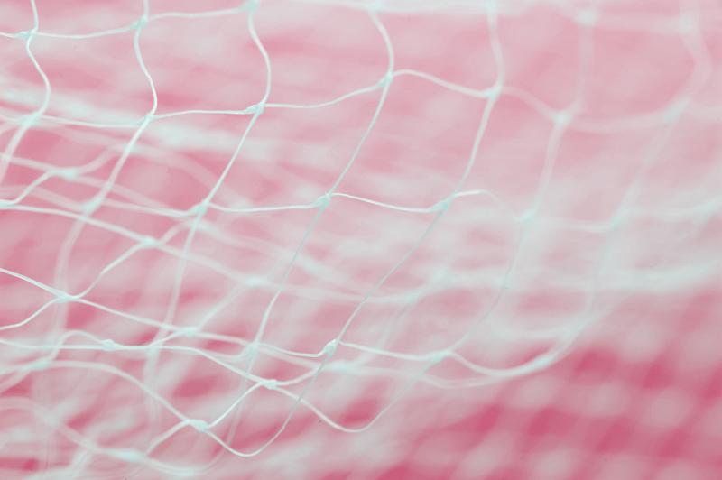 Free Stock Photo: Thin mesh netting with out of focus elements over pink background with copy space