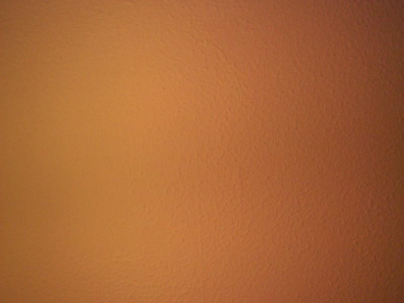 Free Stock Photo: Smooth textured full frame close up dark orange background with vignette and copy space