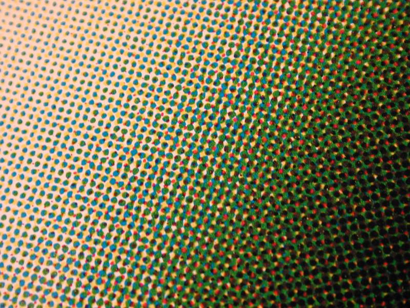 Free Stock Photo: Extreme close up view on offset printing halftone matrix pattern in green, red and yellow gradient