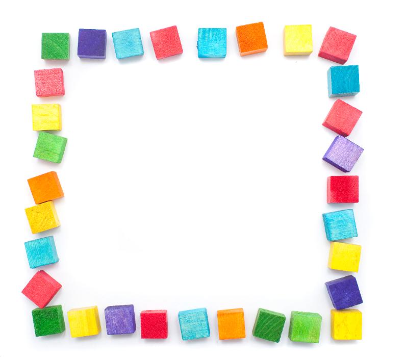 Free Stock Photo: Colorful square wooden toy building block border on white in the colors of the rainbow for educational or kids themed concepts