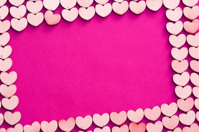 Free Stock Photo: Pink heart background for Valentines Day, Mothers Day, a wedding or anniversary with central copy space for a message to a sweetheart or loved one