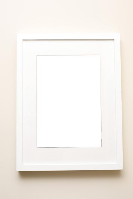 Free Stock Photo: Blank picture frame in white over wall with copy space for portrait or mirrored reflection