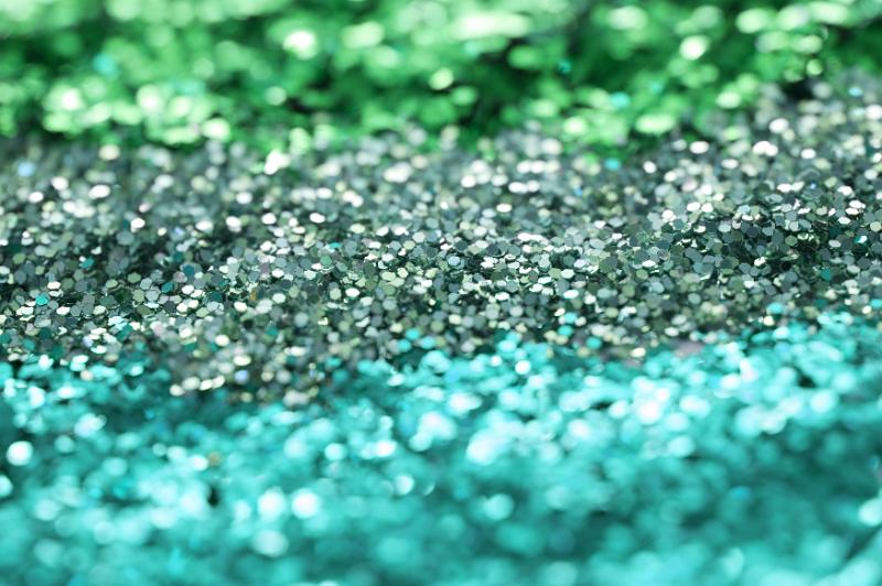 Free Stock Photo: Background texture of green and cyan glitter for creative handicraft or for use as a festive holiday or celebration background arranged in diagonal stripes