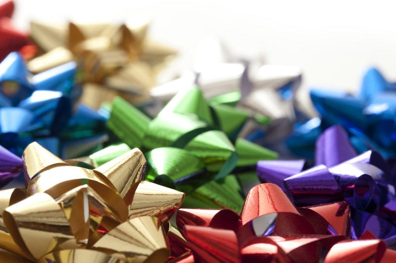 Free Stock Photo: An assortment of metallic gift wrapping bows in various bright colours