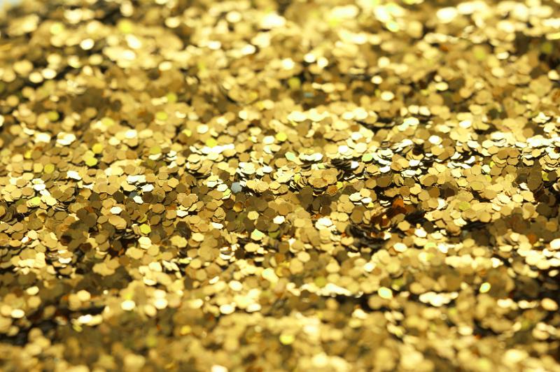 Free Stock Photo: a background of gold coloured glitter in closeup
