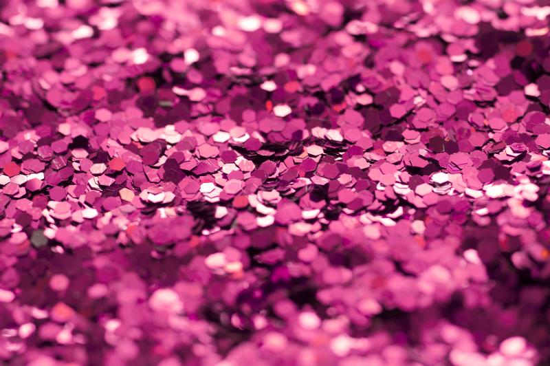 Free Stock Photo: Abstract Background - Close Up of Colorful Magenta Pink Glitter Scattered Full Frame in Selective Diffuse Focus with Copy Space