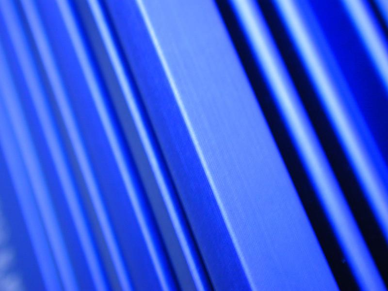 Free Stock Photo: Close up background of blue solid diagonal lines from cabinet or metal casing with copy space