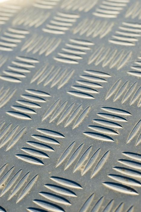 Free Stock Photo: Conceptual background with close up view of indented metal with checkered pattern with rows of four lines each