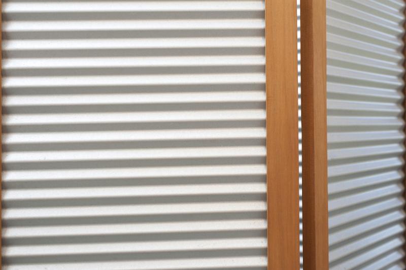 Free Stock Photo: Corrugated steel and finished wood frame barrier for privacy or concealment with copy space