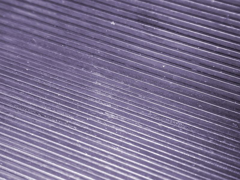 Free Stock Photo: Long parallel purple metal diagonal lines as full frame background with copy space