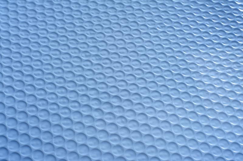 Free Stock Photo: background composed from close up of plastic mat with rows of circles pressed into it