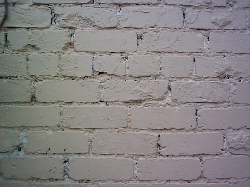 Free Stock Photo: Conceptual background of a brick wall painted over in a light gray and slightly darkened