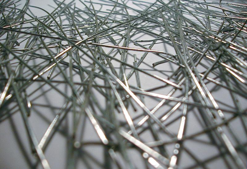 Free Stock Photo: Background composed from extreme close up view of metal wires thrown together against a grey table