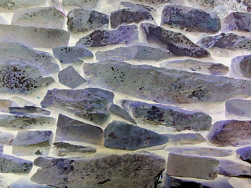 Free Stock Photo: Negative exposure of neatly stacked stones with mysterious white glow in between pieces