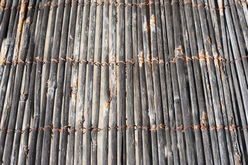 Free Stock Photo: Over head view background of dried and aged bamboo tethered together into mats