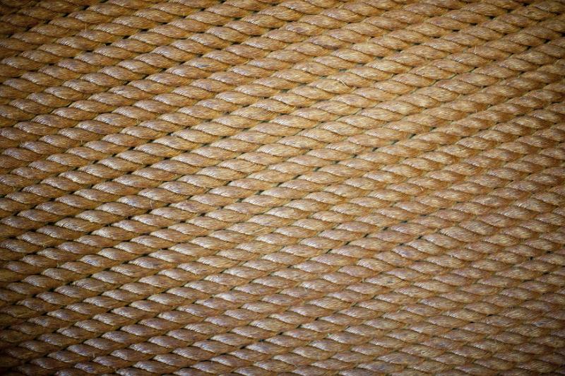 Free Stock Photo: Bound heavy duty rope texture in diagonal pattern with subtle vignette on sides and copy space