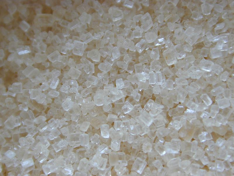 Free Stock Photo: Close up on fine geometry of sugar grains as full frame background with copy space
