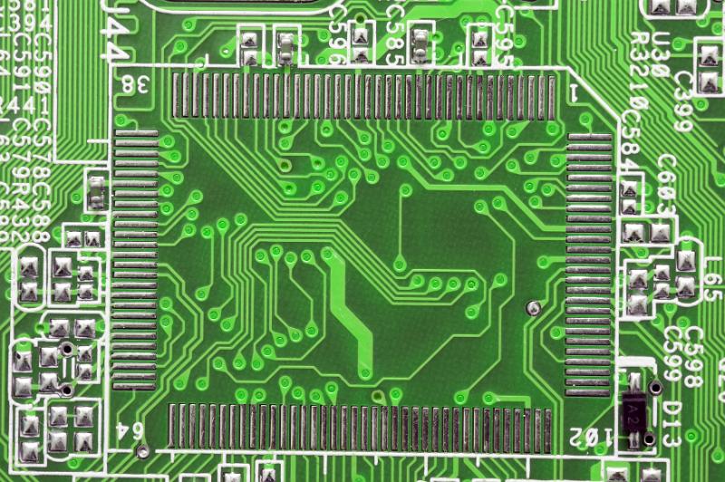 Free Stock Photo: Detail view on green and white printed circuit board with computer chips and copy space