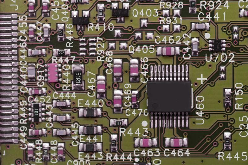 Free Stock Photo: Background with close up of circuit board with tiny components and labeled with letters and numbers