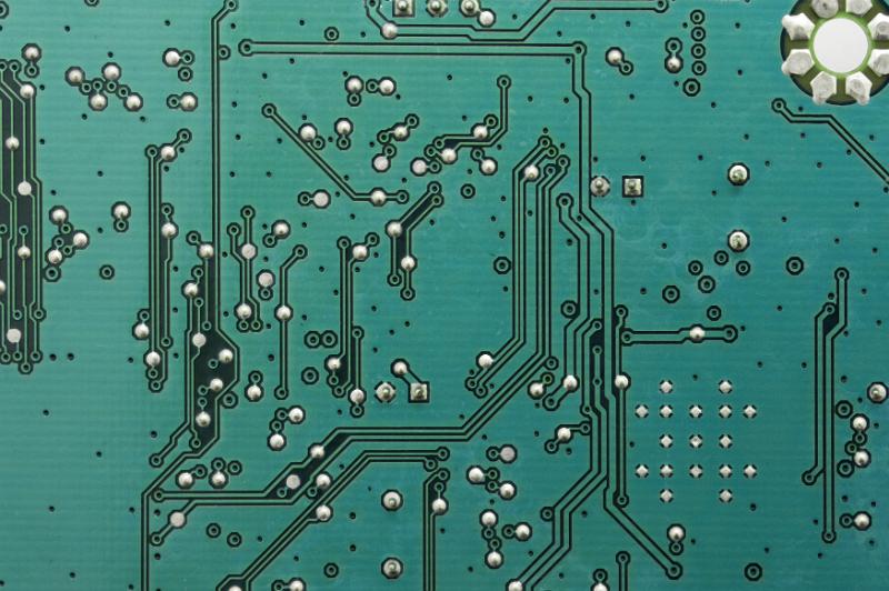Free Stock Photo: Extreme close up background of circuit board colored green and with various soldered wires