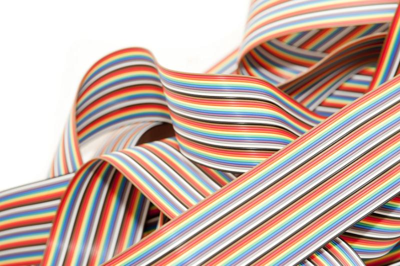 Free Stock Photo: Pile of colorful striped computer ribbon wire in a tangled heap, close up isolated on white with copy space