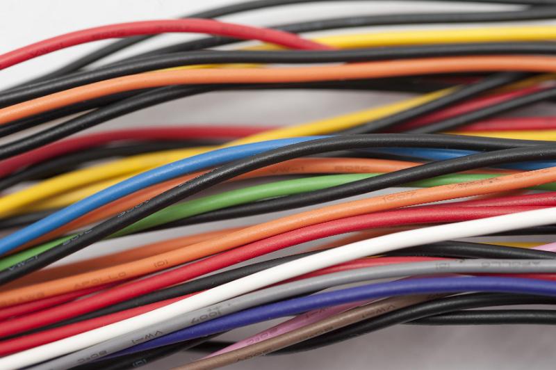 Free Stock Photo: Close up on loose thick electrical wires in red, black, orange, yellow, blue, green and purple