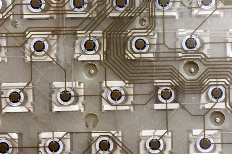 Free Stock Photo: Top down extreme close up view of keyboard or keypad insides parts with wires connecting button contacts