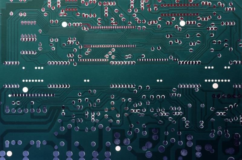 Free Stock Photo: Close up on printed circuit board with electrical components and copy space in the center