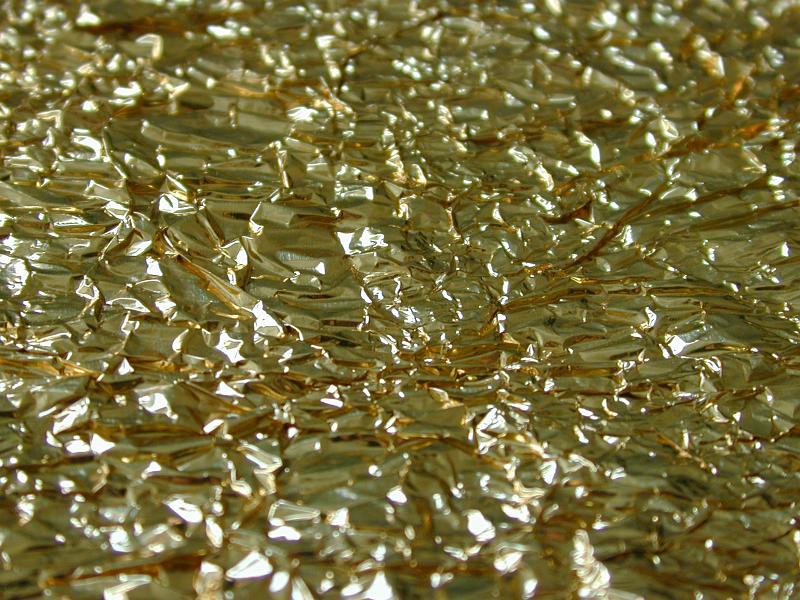 Free Stock Photo: Extreme close up of shiny crumpled gold leaf creating an abstract background