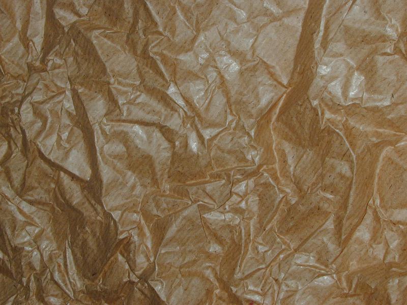 Free Stock Photo: Single layer of simple wrinkled brown wrapping paper as abstract background with copy space