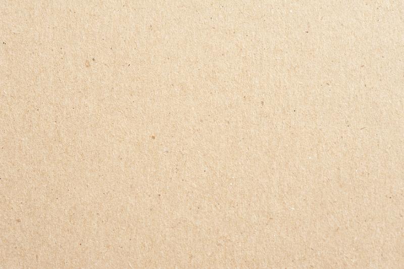 Free Stock Photo: Close up of light brown background with cardboard or coarse recycled fibrous texture with copy space