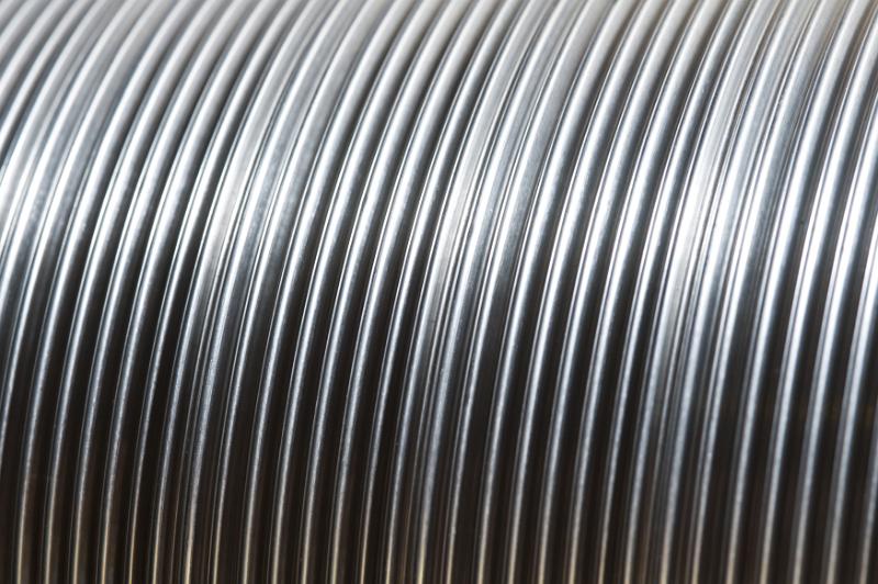 Free Stock Photo: Full frame close up on new galvanized steel ribbing for pipes or curved metallic lines