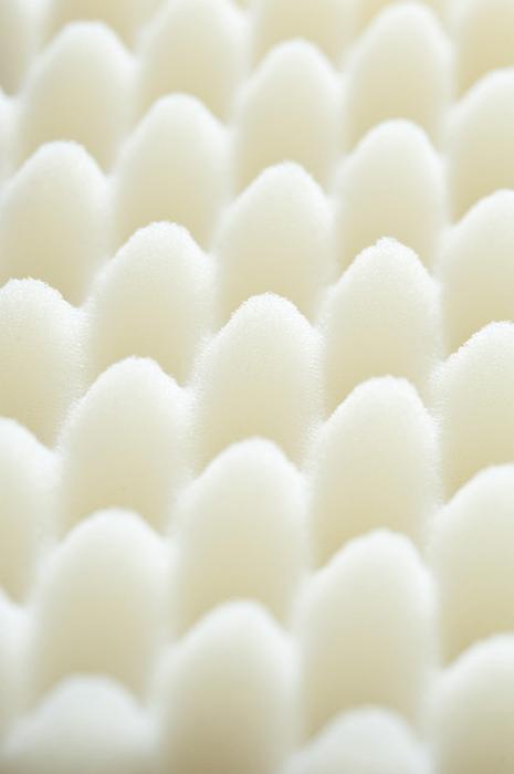 Free Stock Photo: Alternating rows of white rounded soft sponge shipping foam in top down extreme close up