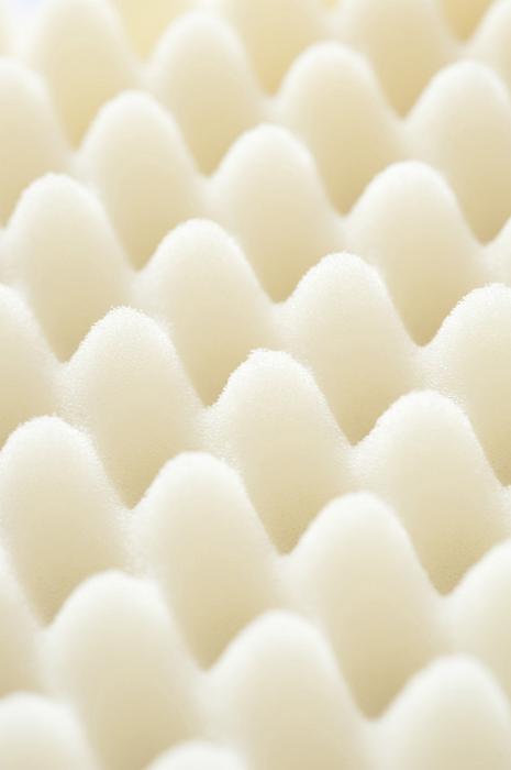 Free Stock Photo: Close up on raised and recessed sections of soft synthetic sponge packing roll with copy space