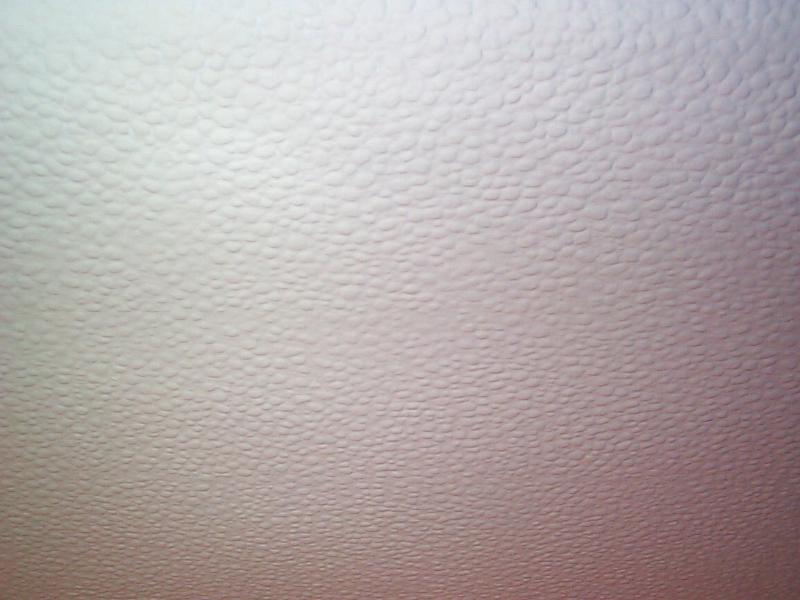Free Stock Photo: Abstract background composed of a close up view of a bubble textured wall
