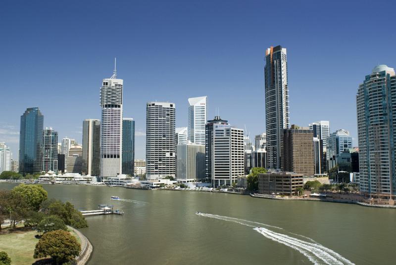 Free Stock Photo: Brisbane River with boats passing the city skyline with its modern architecture and skyscrapers in the CBD, travel and tourism concept to Australia