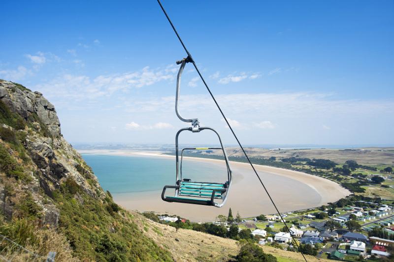 Free Stock Photo: An empty mountain skyline chairlift with coastal and landscape views in Stanley, Australia.