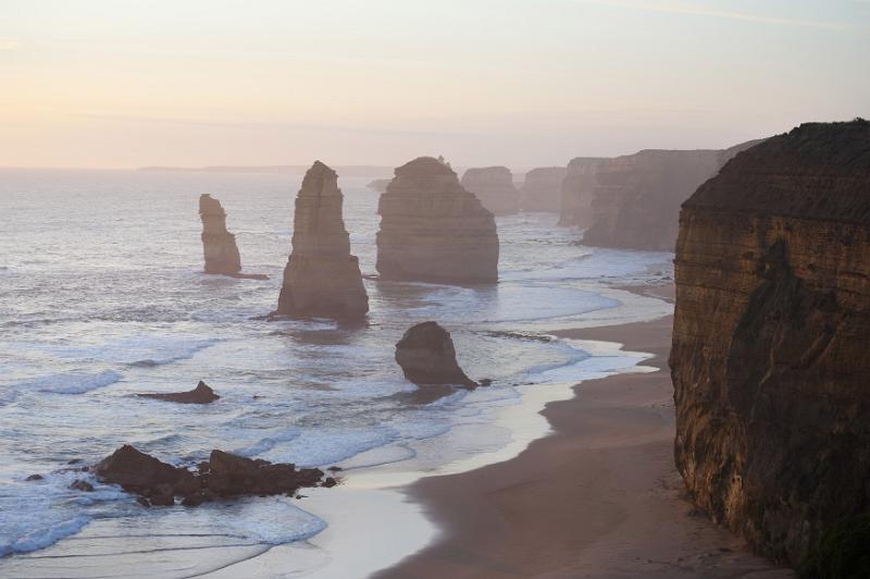 Free Stock Photo: The twelve Apostles collection of limestone rock stacks in Australia in Port Campbell National Park, Victoria viewed along the beach on a misty day