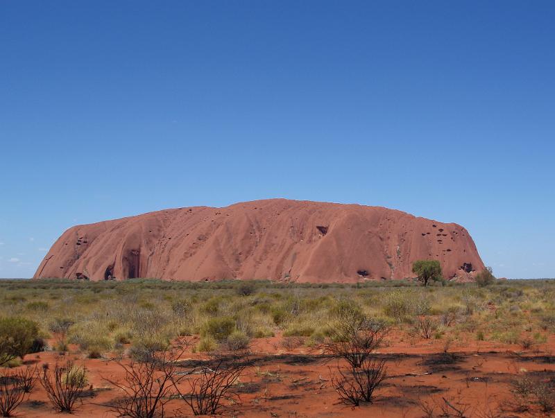Free Stock Photo: View of Uluru, or Ayers Rock, Northern Territory, central Australia, an iconic sandstone formation sacred to the Anangu, the Aboriginal people of the area