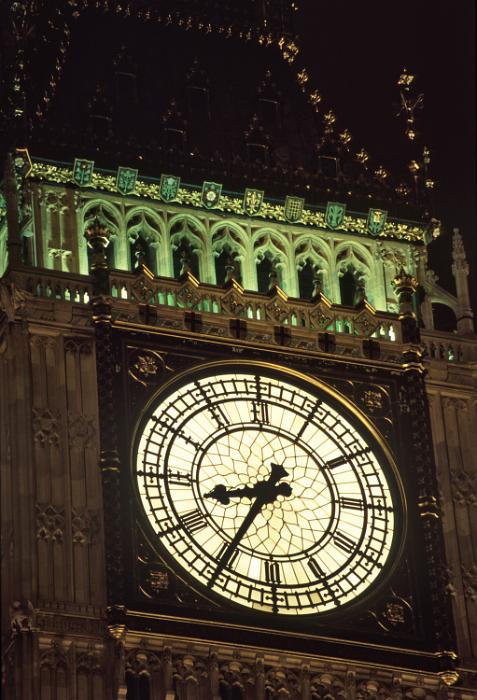 Free Stock Photo: Close up architectural detail of the clock dial on ornate stone facade of the Big Ben clock tower in London, England, a well known historical landmark
