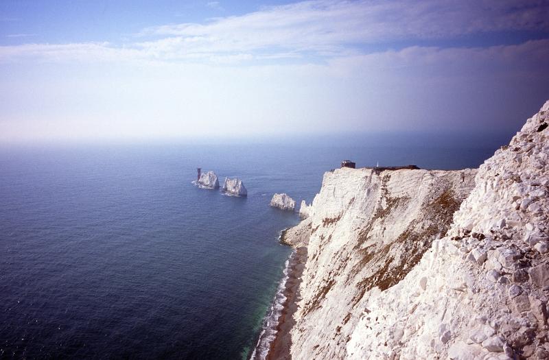 Free Stock Photo: View of the Needles, Isle of Wight, a row of three chalk stacks rising out of the sea with a lighthouse on the farthest one