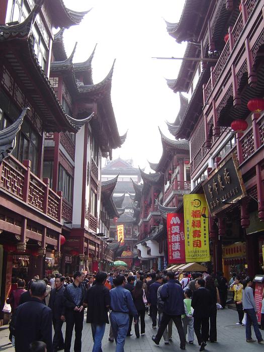 Free Stock Photo: Busy Street Scene in Area of City Lined with Traditional Chinese Architecture on Hazy Day, China
