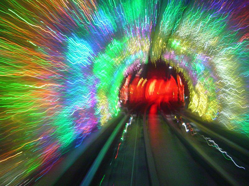 Free Stock Photo: Abstract of Subway Tunnel with Colorful Streaming Psychedelic Lights as seen from Inside Tunnel