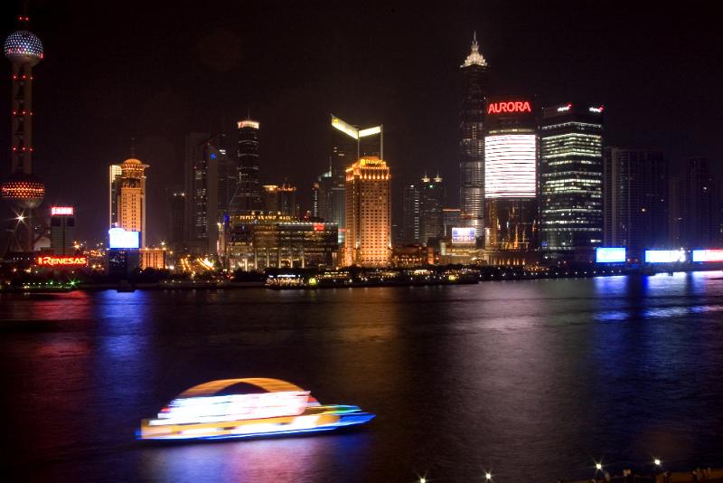 Free Stock Photo: Long Exposure of Shanghai at Night - Blurred Boat on River Traveling Past Illuminated Skyline of Shanghai, China